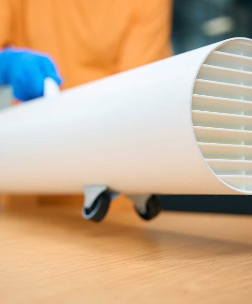 cleaning-worker-uses-an-ozone-generator-while-cleaninig